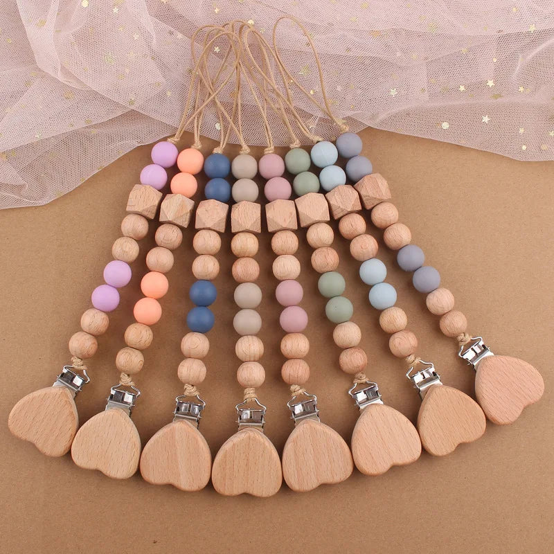 Attache tétine perles en bois de hêtre sécurisé