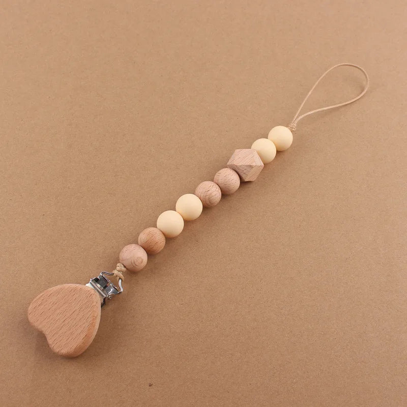Attache tétine perles en bois de hêtre sécurisé