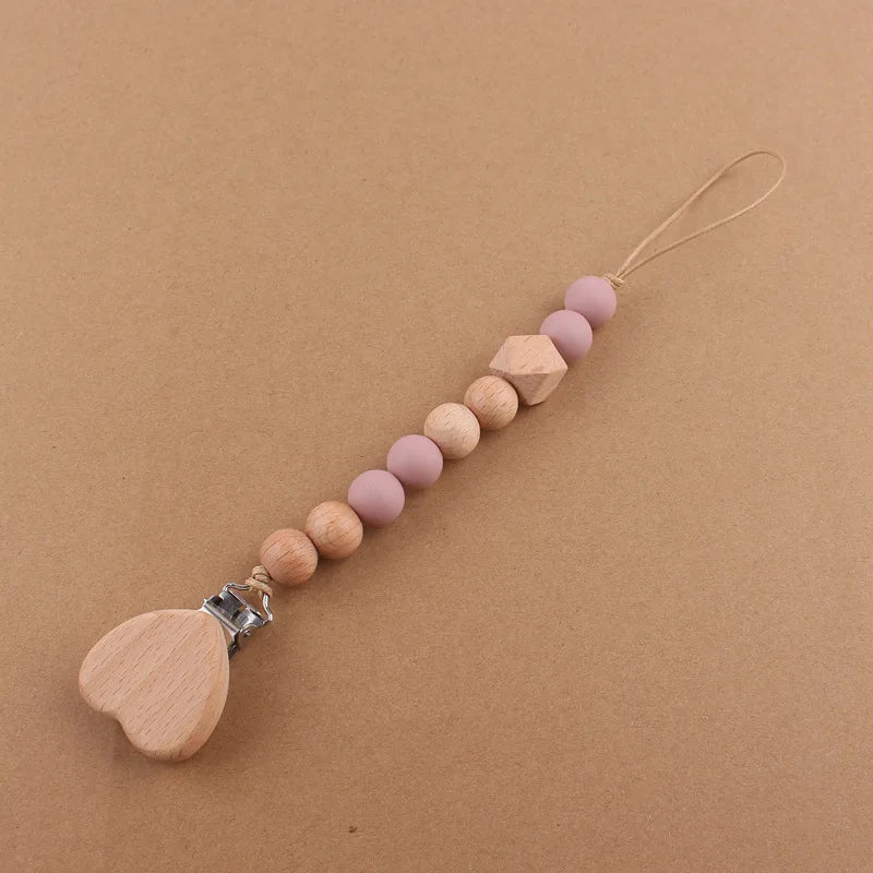 Attache tétine perles en bois de hêtre sécurisé