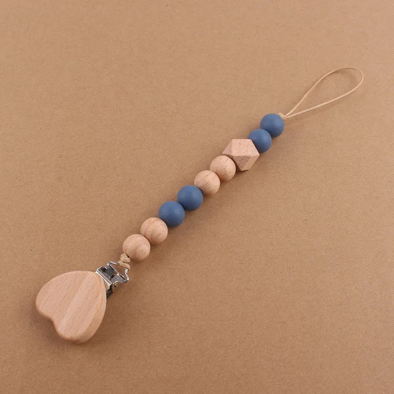 Attache tétine perles en bois de hêtre sécurisé