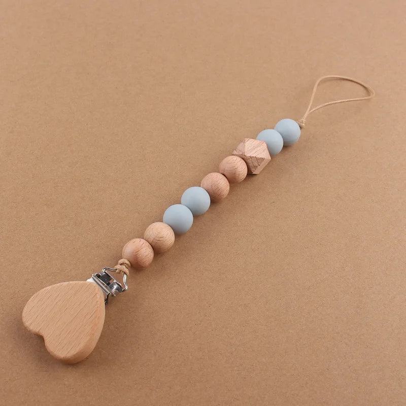 Attache tétine perles en bois de hêtre sécurisé