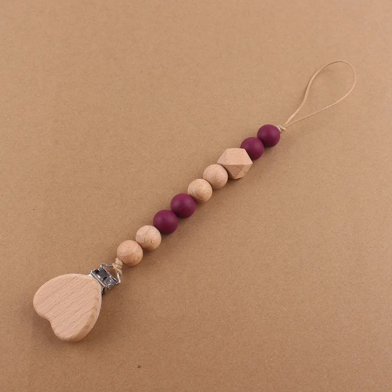 Attache tétine perles en bois de hêtre sécurisé