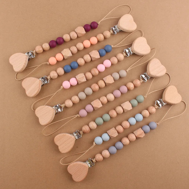 Attache tétine perles en bois de hêtre sécurisé