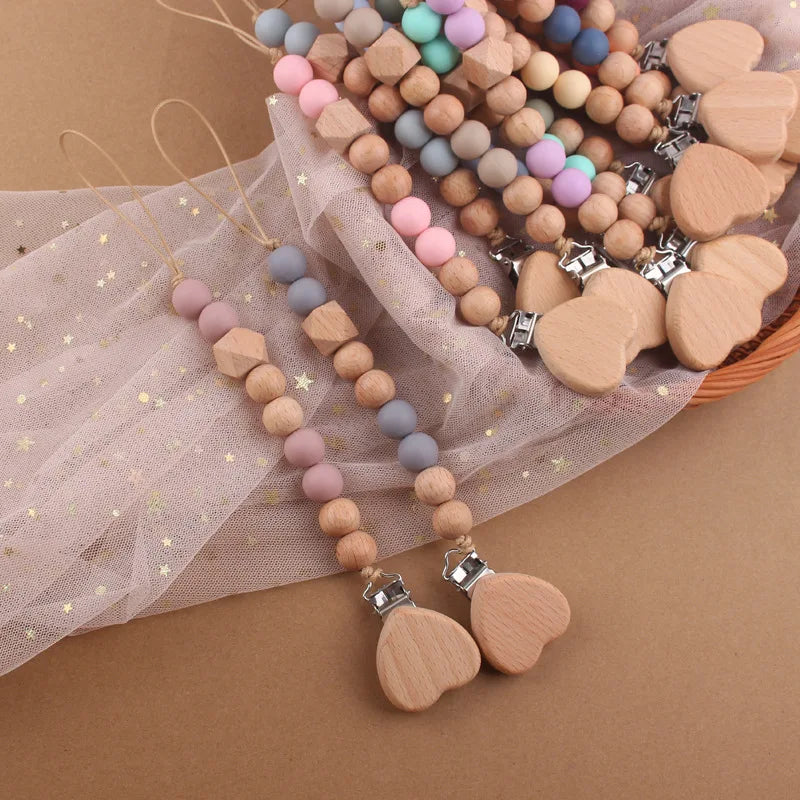 Attache tétine perles en bois de hêtre sécurisé