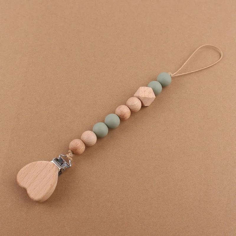 Attache tétine perles en bois de hêtre sécurisé