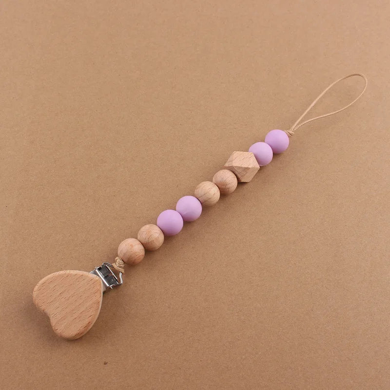 Attache tétine perles en bois de hêtre sécurisé