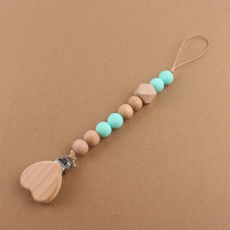 Attache tétine perles en bois de hêtre sécurisé