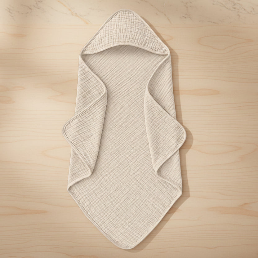 Cape de bain à capuche bébé en mousseline