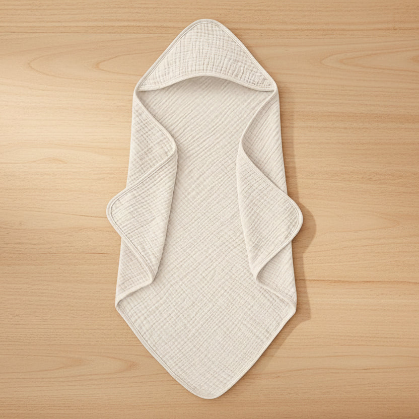 Cape de bain à capuche bébé en mousseline